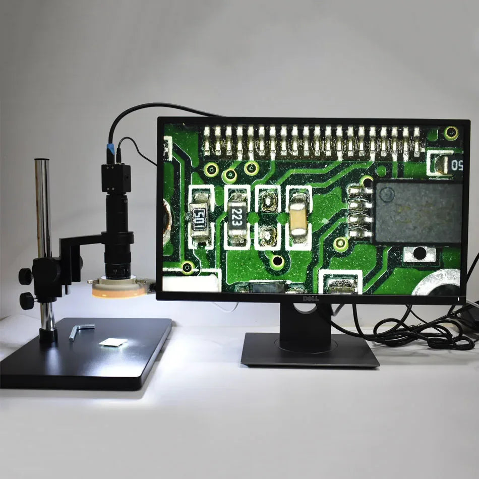PHONEFIX 2.0MP VGA HDMI digital microscope camera with C-mount CMOS, showing close-up view of microscope sample and camera connection.
