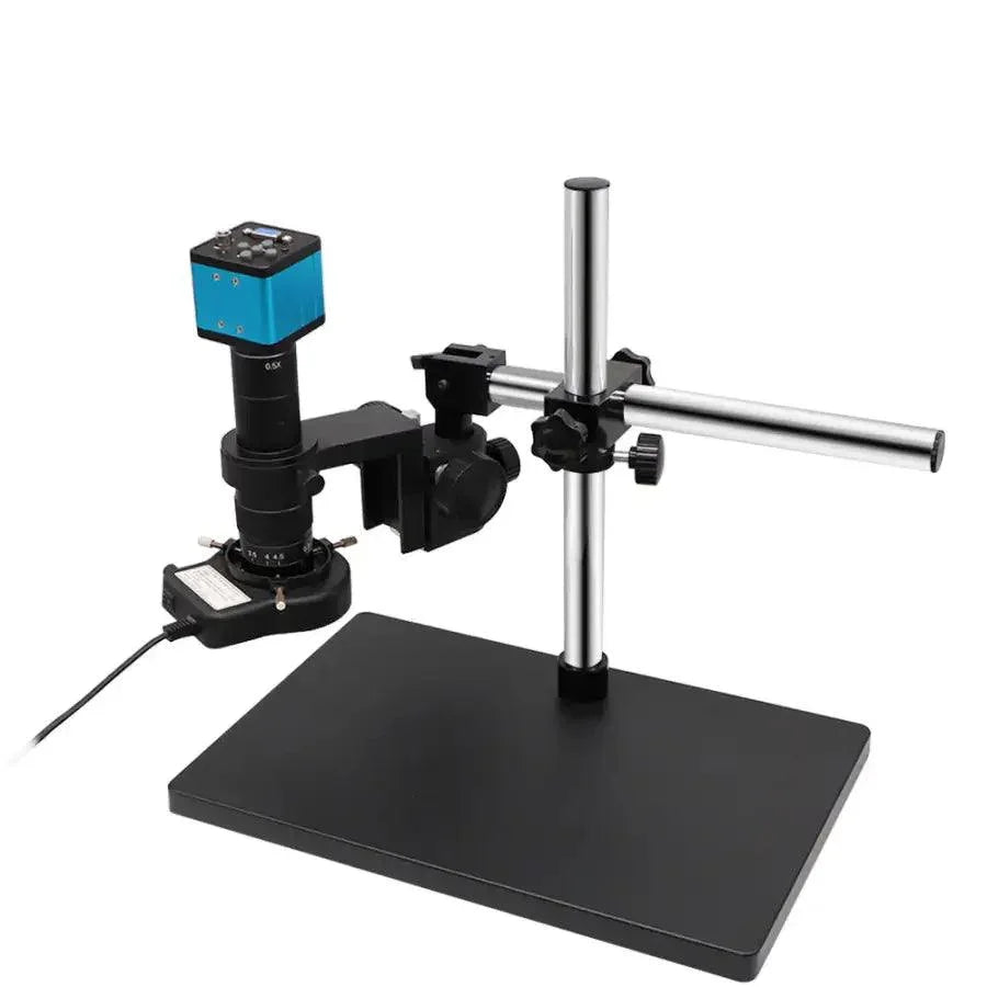 PhoneFix 38MP HDMI USB digital video microscope camera for PCB soldering, showing the compact device connected to a computer.