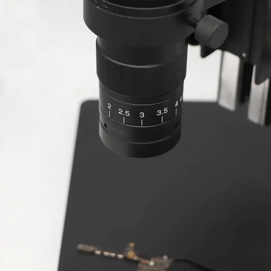 PHONEFIX 38MP HDMI USB digital video microscope camera for PCB soldering, showing detailed close-up of circuit board inspection.