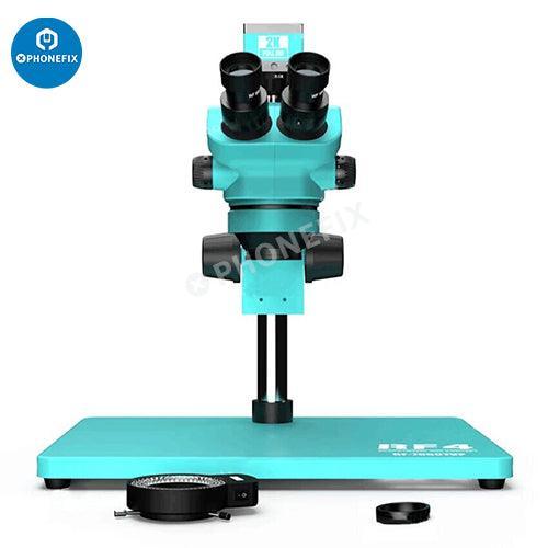 PHONEFIX RF7050TVP trinocular stereo microscope with 7x-50x zoom and 2K HD camera, showing the microscope with eyepieces and camera attachment.