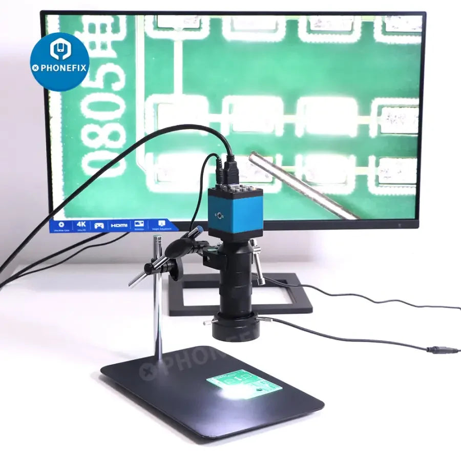 PhoneFIX 13MP industrial microscope set with magic arm, 130X lens, super clamp, and microscope for detailed inspection work.