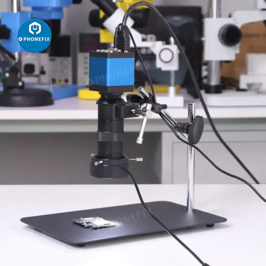 PHONEFIX 13MP industrial microscope set with magic arm, 130X lens, super clamp, and microscope for detailed inspection.