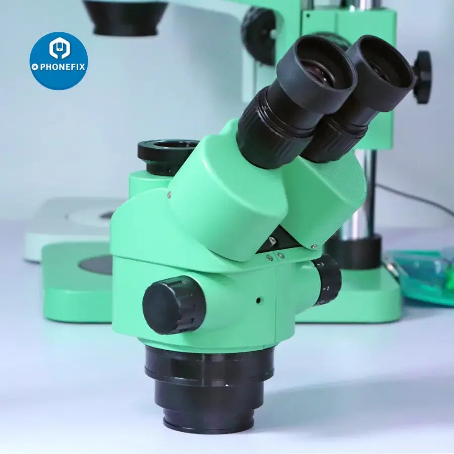 PhoneFix green trinocular stereo zoom microscope with adjustable 3.5X-180X magnification for phone PCB repair.