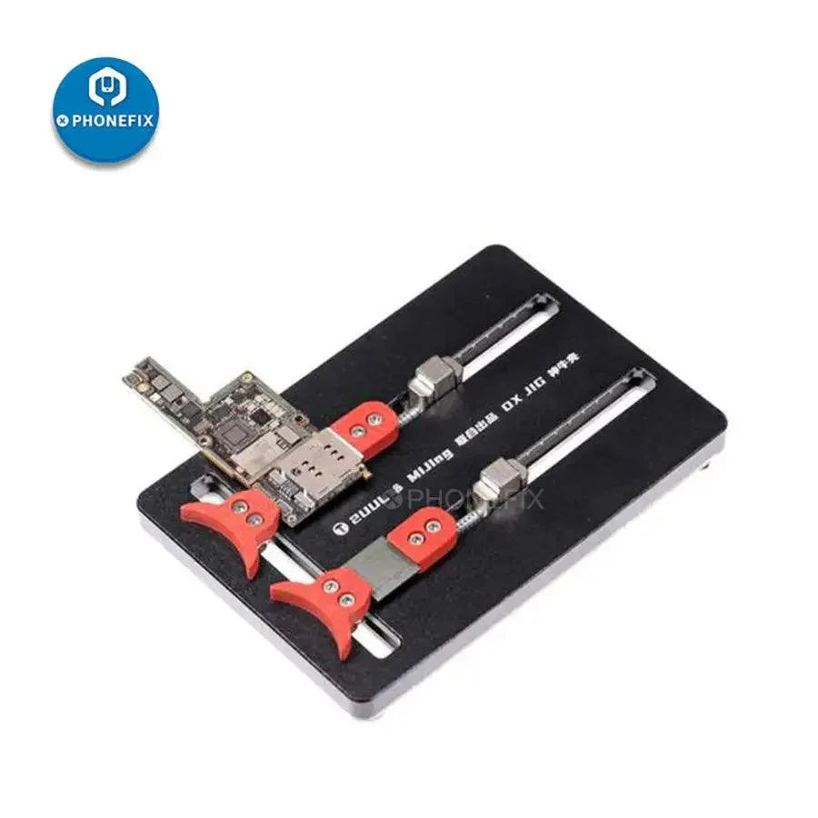 PhoneFix 2UUL OX JIG multifunction PCB motherboard test fixture for phone repair, shown holding a phone motherboard securely.