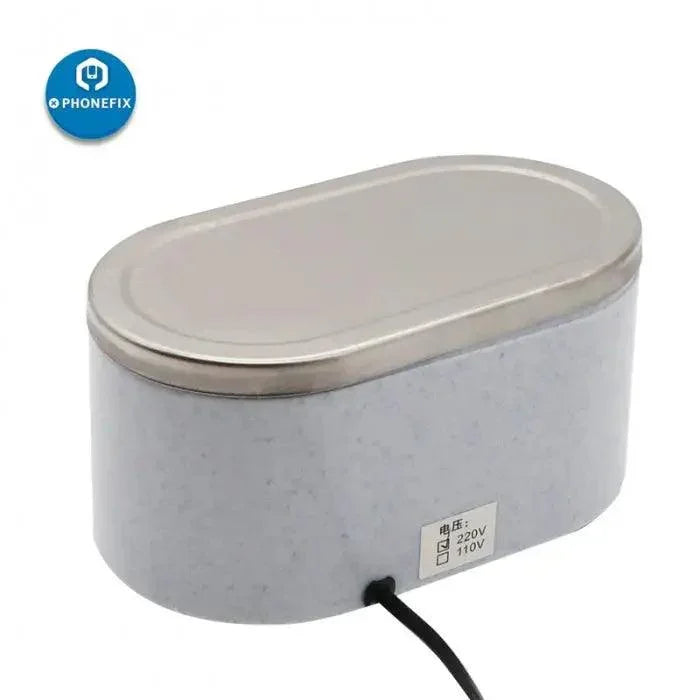 Mini PhoneFix ultrasonic cleaner for circuit boards, compact device used for precise cleaning of electronic components.