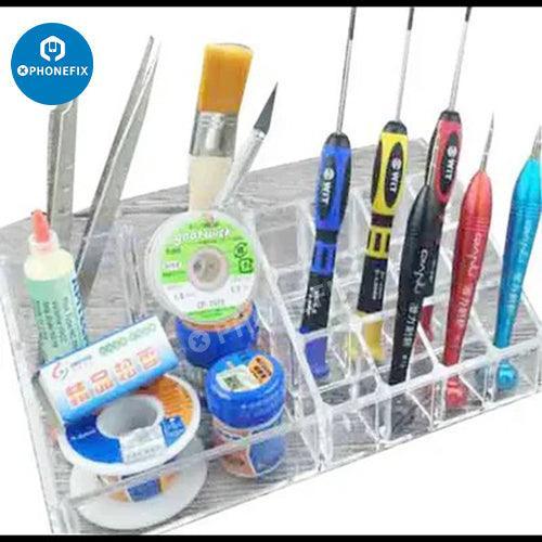 PhoneFix mobile repair parts and tools storage box for organizing small tools and accessories in a workspace.