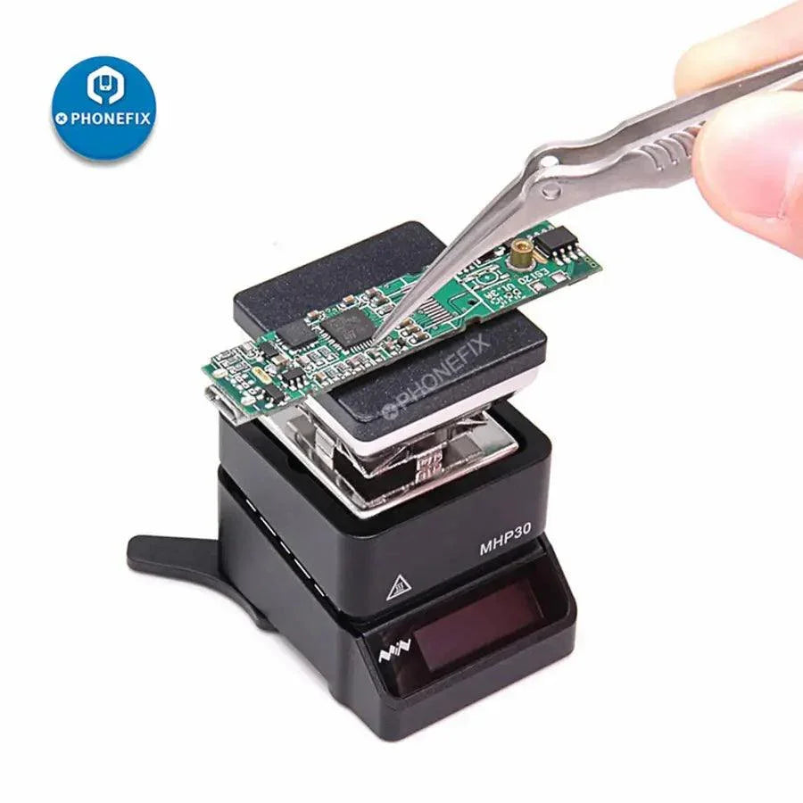 Plateforme chauffante MHP30 pour mini-PCB de PHONEFIX, destinée au préchauffage des composants BGA IC, présentée ici avec des cartes de circuits imprimés électroniques.