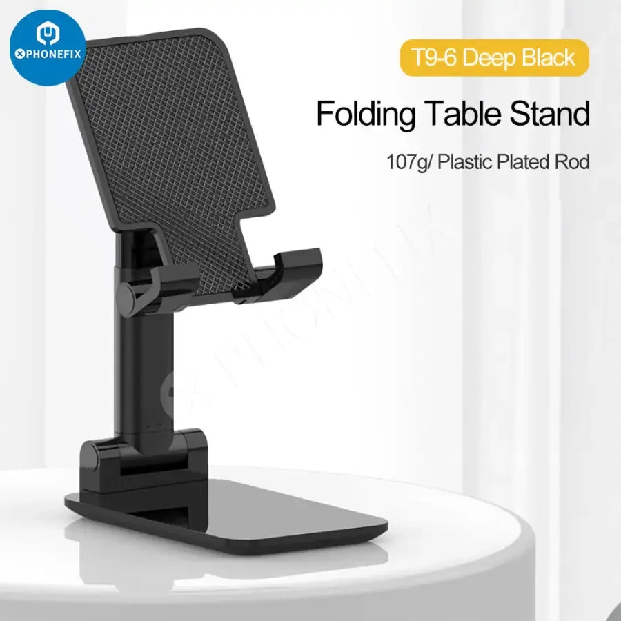 Foldable aluminum alloy phone and tablet holder stand by PHONEFIX, designed for desktop use with adjustable support.