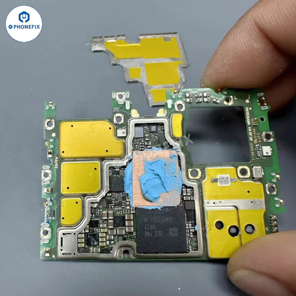 PhoneFix mobile phone repair tools with copper heatsink sheets and thermal conductive pads for CPU cooling and repair.