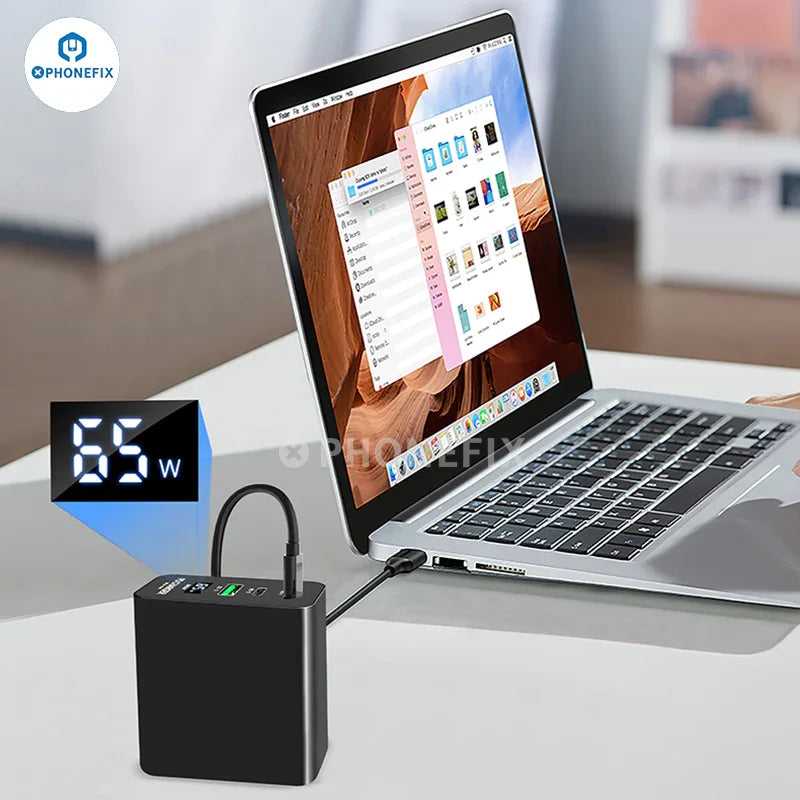 PHONEFIX i-Helper 65W multi-port USB fast charger with LED digital display for phone charging, showing multiple ports and LED screen