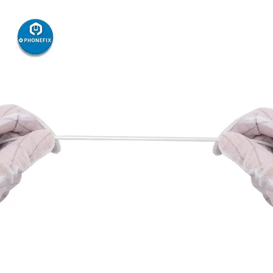 USB C to Lightning charging cable for iPhone, iPad, and MacBook by PHONEFIX, connected to devices for fast charging.