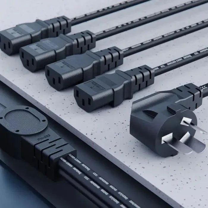 PHONEFIX 4-in-1 AC power cable with four ports, multi-purpose converter for charging devices, black power cable with multiple outlets.