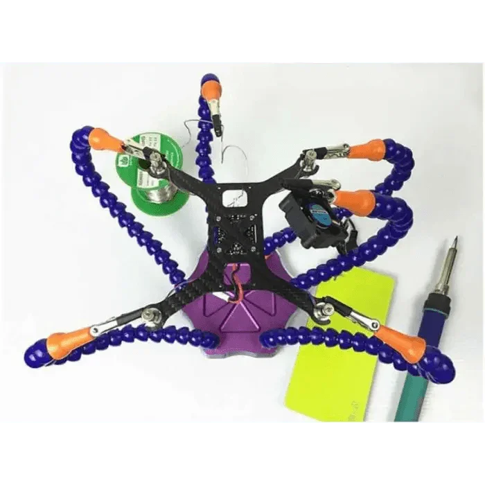 Flexible arms PCB soldering holder from PHONEFIX for RC drone repair, securing circuit boards during soldering tasks.