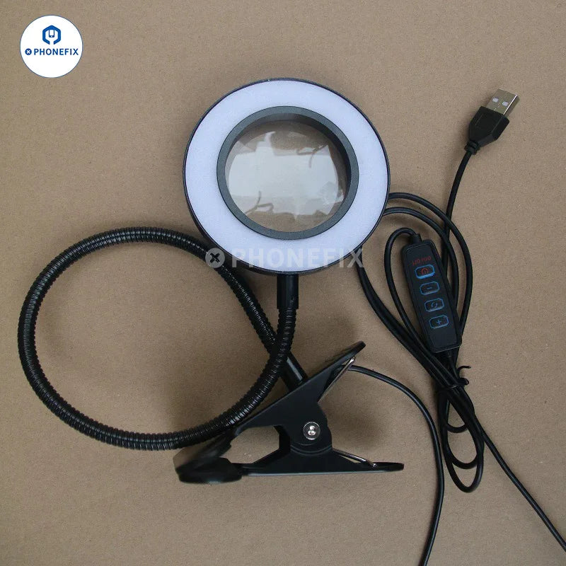 Black adjustable PHONEFIX 48 LED eye protection desk ring light clipped for portable use, ideal for photography or video calls.