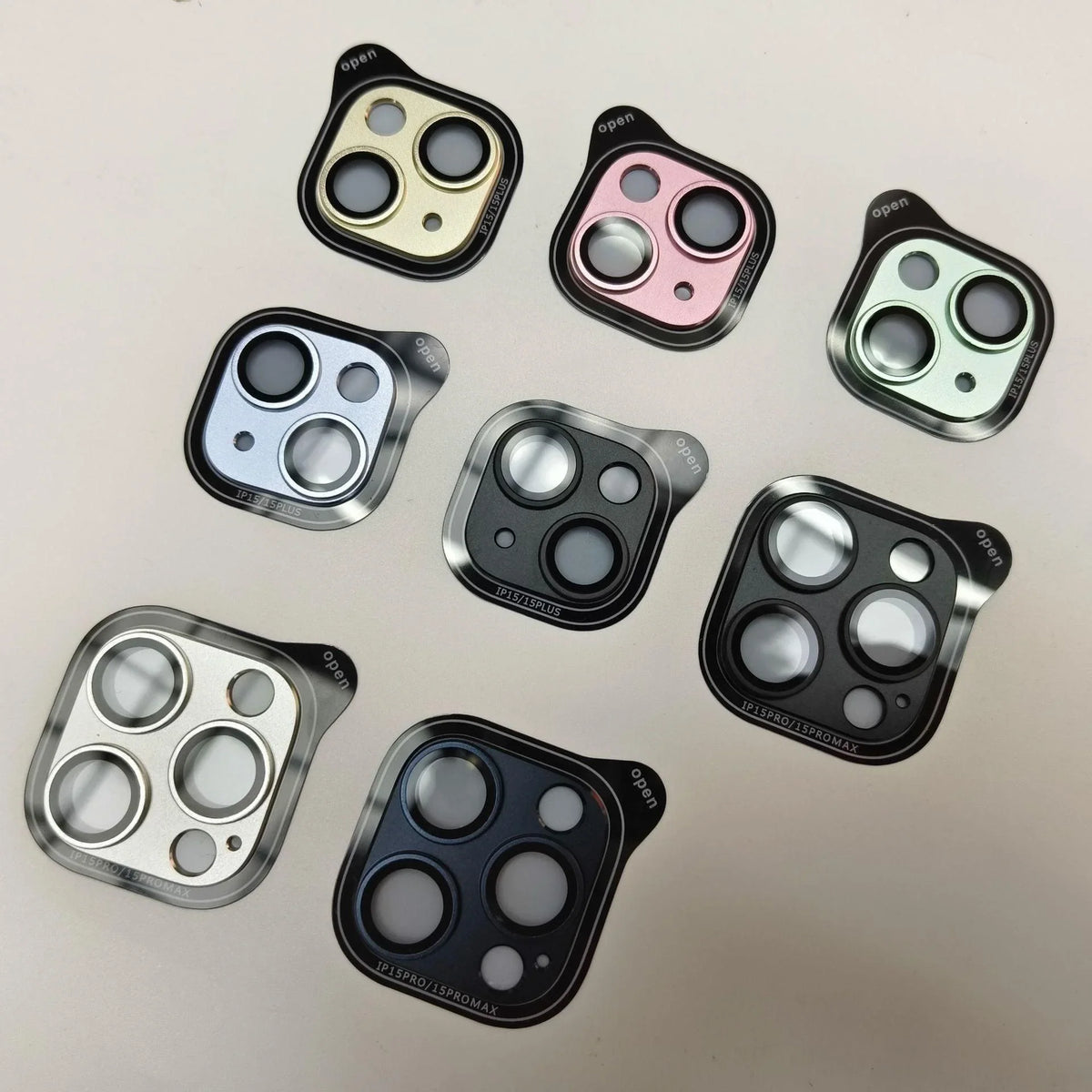 Pink shockproof metal rear camera lens protector for iPhone 15 series, designed to safeguard the camera lens from scratches and impacts.