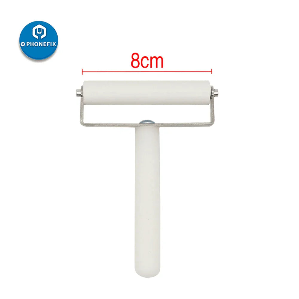 White silicone roller screen repair tool for LCD and OCA polarizing film, used for applying screen adhesive in phone repairs.