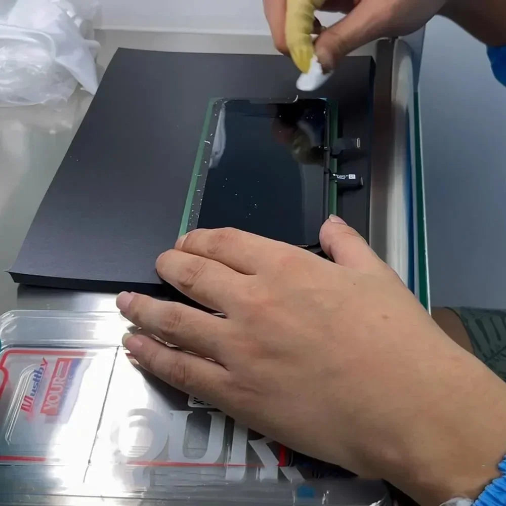PHONEFIX LCD screen alignment mold with bezel frame for iPhone 14, 15, 16 Pro Max, showing precision tool with plastic frame and markings.