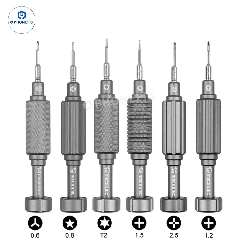 PHONEFIX MECHANIC MORTAR SE Plus/Pro/Air/Max iShell 2D 3D screwdriver set with various screwdrivers and bits, laid out on a workspace.