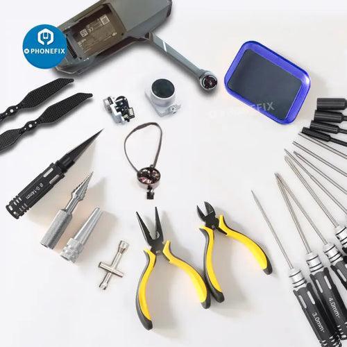 PhoneFix 13-in-1 RC car screwdriver set with pliers, hex sleeves, and socket tools for repair and maintenance.