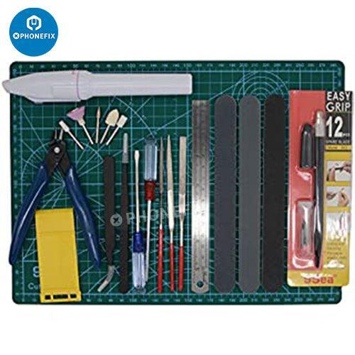 Kit de réparation de téléphones portables PhoneFix 9 en 1 avec outils de tournevis et figurine pour la réparation et le bricolage.