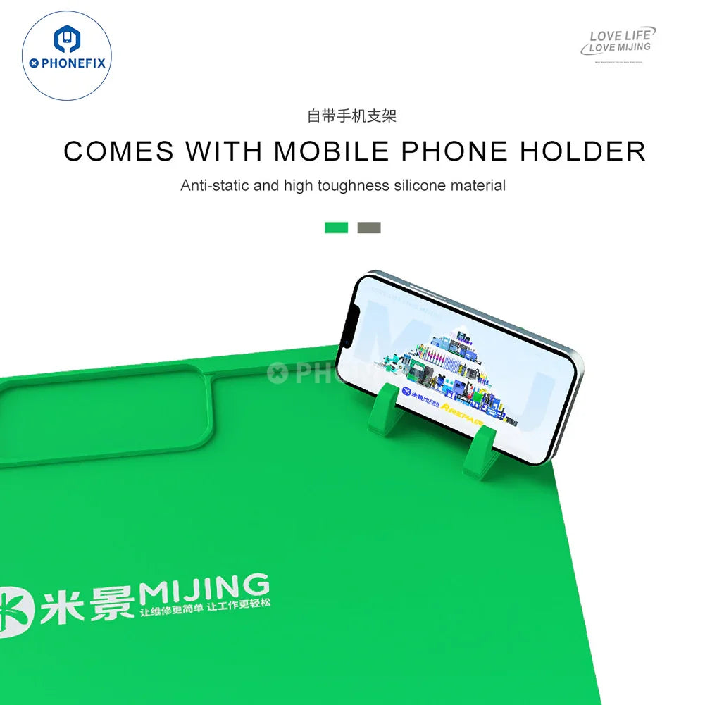 Green PHONEFIX Mijing FM-11 FM-12 silicone pad with phone screwdriver holder, flexible silicone surface for device repairs.