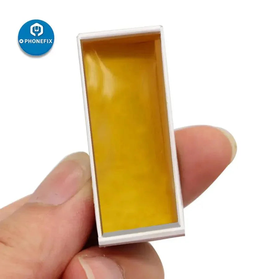 Small carton of PhoneFix rosin solder paste for phone repair, used as welding flux in electronics soldering.
