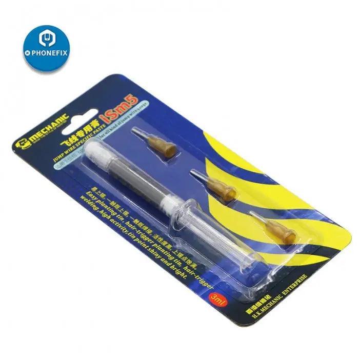 Pâte à souder spéciale pour fil de connexion Mechanic iSm5 3ML pour la réparation de circuits imprimés par PHONEFIX, montrant le récipient de pâte à souder et les outils de réparation de circuits imprimés.