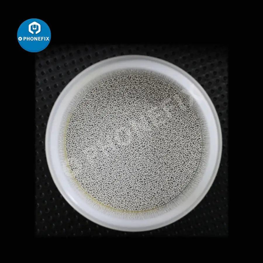 PhoneFix BGA solder balls for XZ25/XZW25 motherboard repair, used with mechanic solder paste tool for electronic repairs.