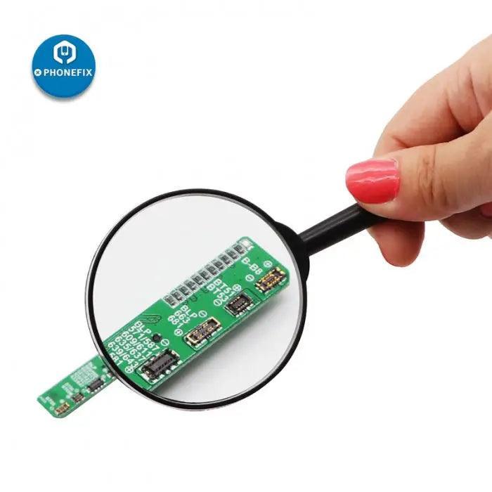 PHONEFIX 5X handheld soldering magnifying glass for jewelry and phone repair, featuring a clear lens and ergonomic handle.