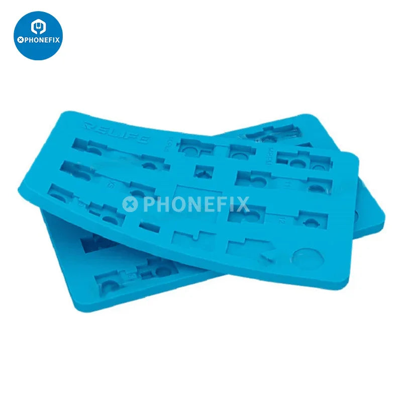 Relife RL-004FB Camera Face ID Repair Silicone Pad for iPhone on black soldering mat, used for phone repair and face ID restoration.