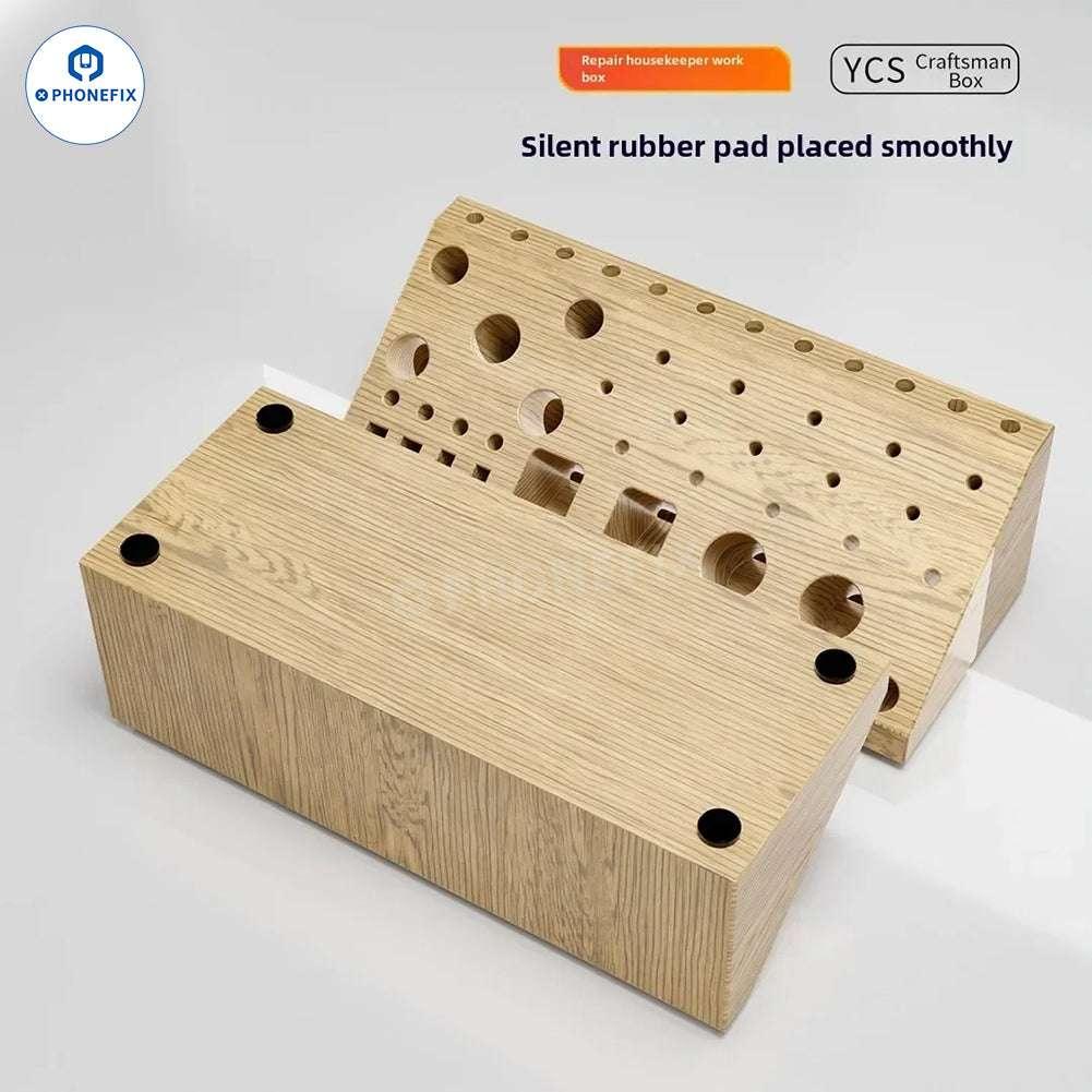 PhoneFix YCS 59-in-1 wooden storage box with screwdriver and tweezers tools organizer, showing compartments and tools inside.