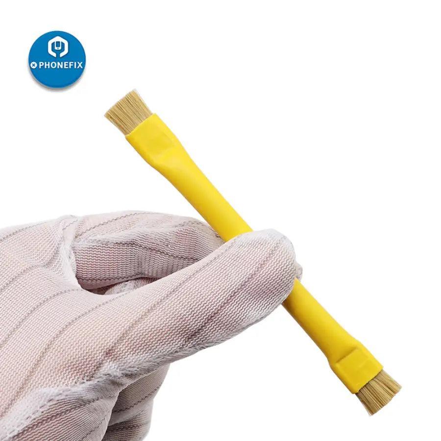 PhoneFix anti-static double-head insulation cleaning brush, yellow hard-bristled hand tool for electronics and appliance maintenance.