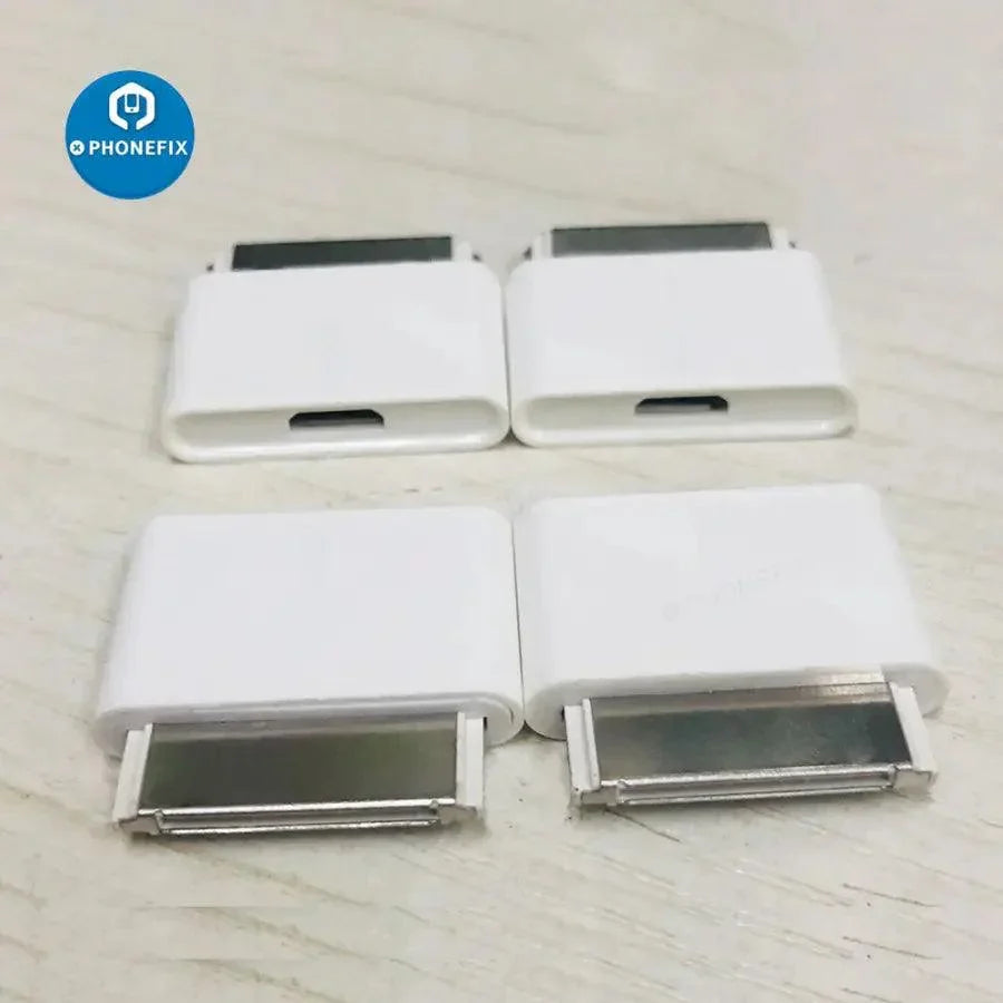 PhoneFix Lightning 8-pin female to 30-pin male adapter for iPhone 4 and iPad 2/3, with USB port tester on the device.