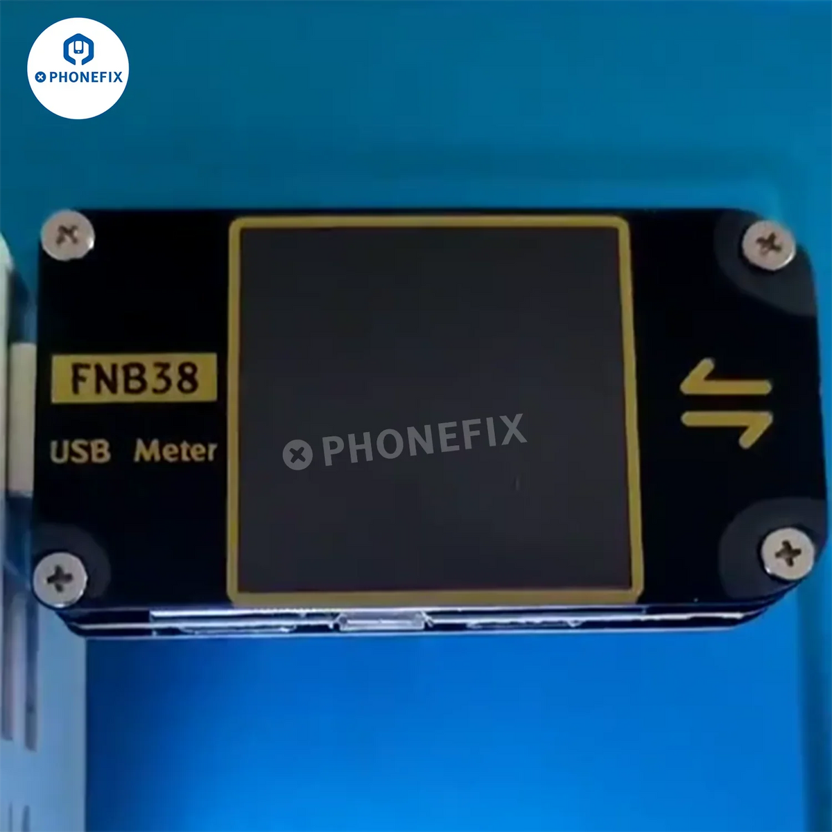 PHONEFIX FNB38 FNIRSI-C1 USB Tester showing voltage and current readings on a USB port for fast charging protocol testing.