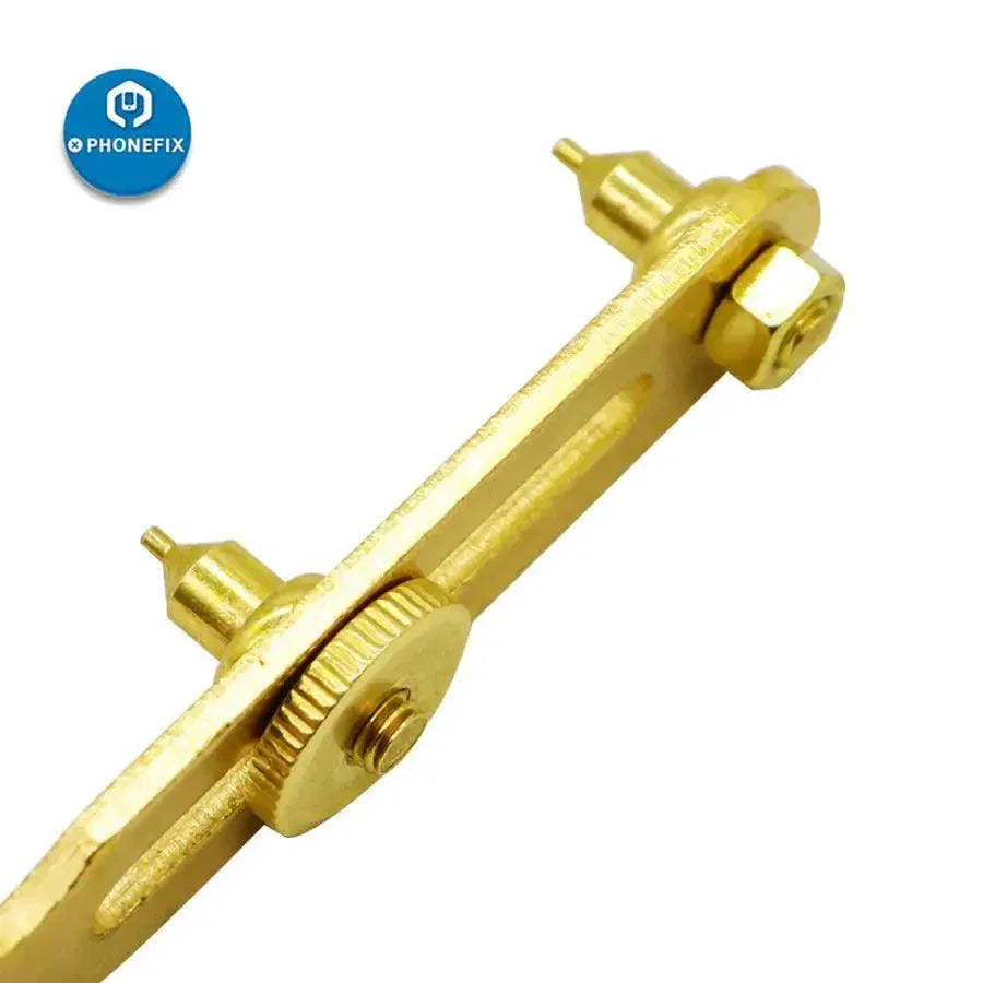 Gold PhoneFix two-claw screw watch back case opener tool for watchmaker repair, designed for opening watch cases safely.