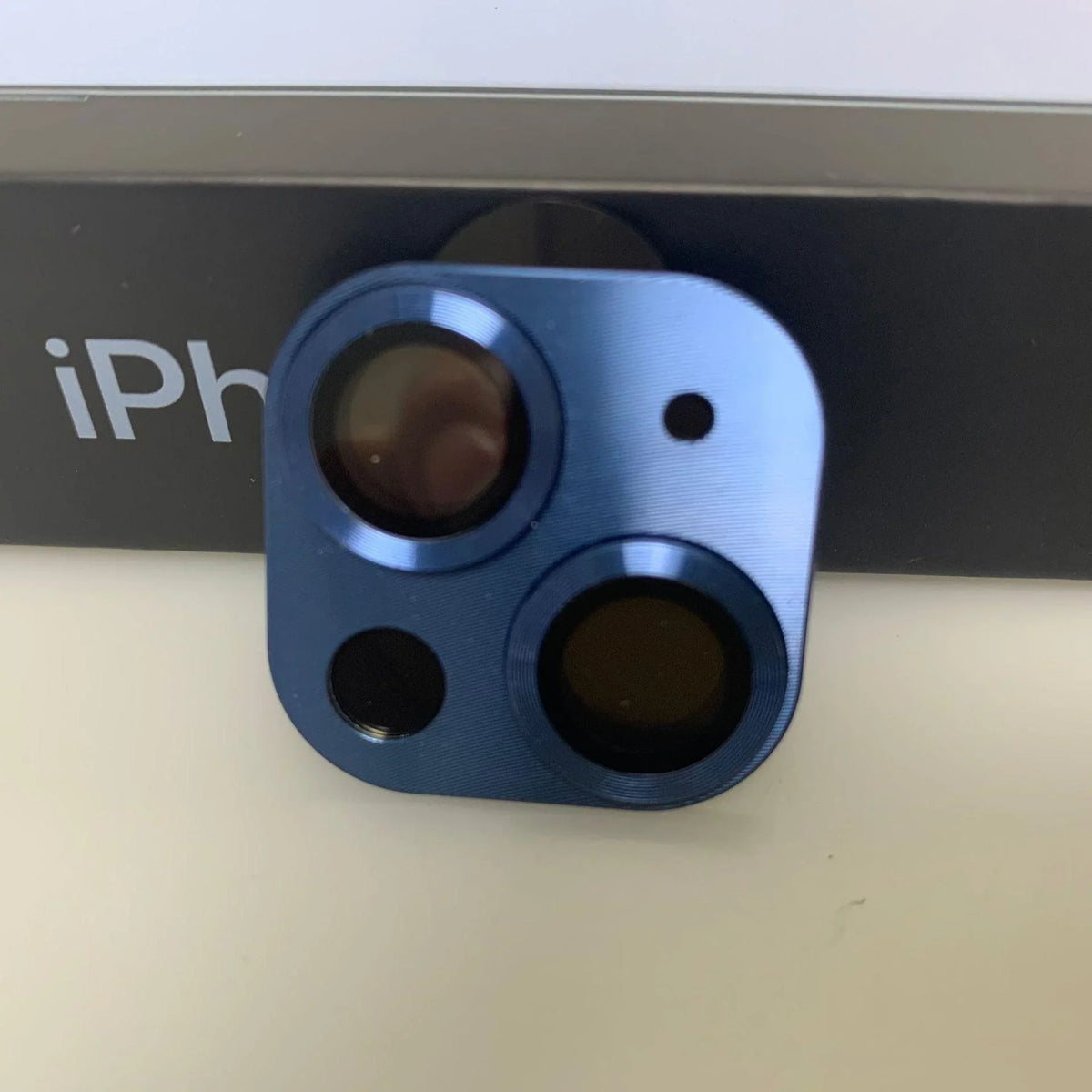 Silver tempered glass rear back camera lens protector for iPhone 13-14 Pro Max, designed by PHONEFIX for rear back camera protection.